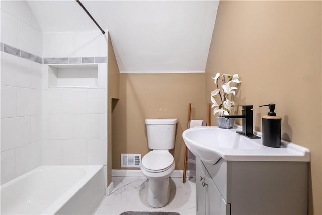 full bathroom featuring vanity, bathing tub / shower combination, toilet, and lofted ceiling