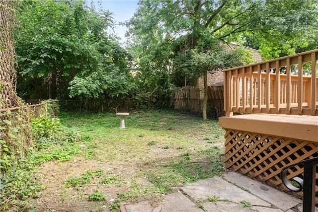 view of yard featuring a deck