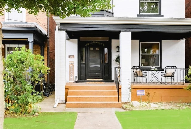 property entrance with a porch