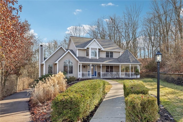 view of front of property featuring covered porch