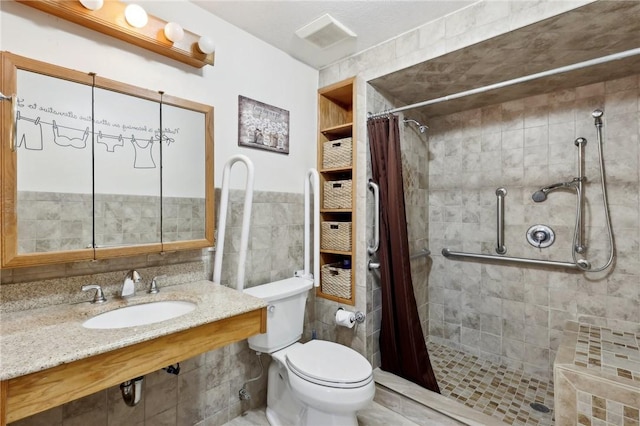 bathroom featuring toilet, sink, walk in shower, and tile walls