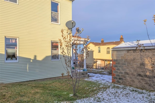 view of snow covered property