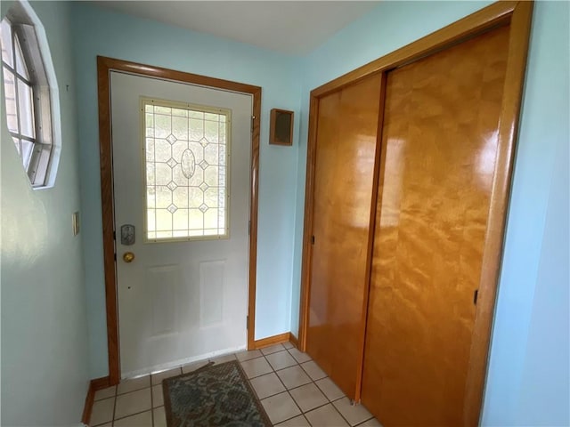 entryway featuring light tile patterned floors