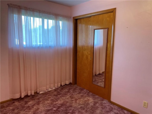 spare room with carpet flooring