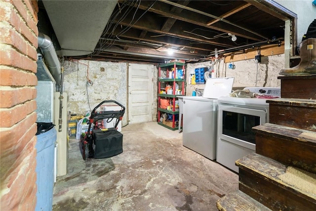 basement with washer and clothes dryer