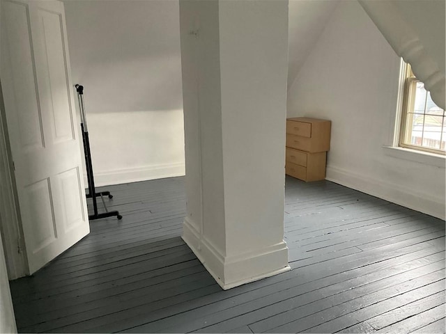 bonus room with wood-type flooring