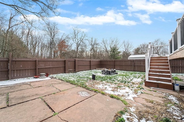 view of yard featuring a patio area and an outdoor fire pit