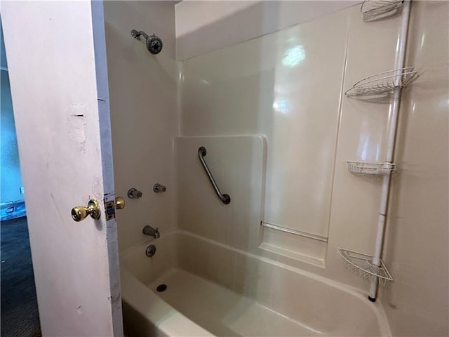 bathroom featuring  shower combination