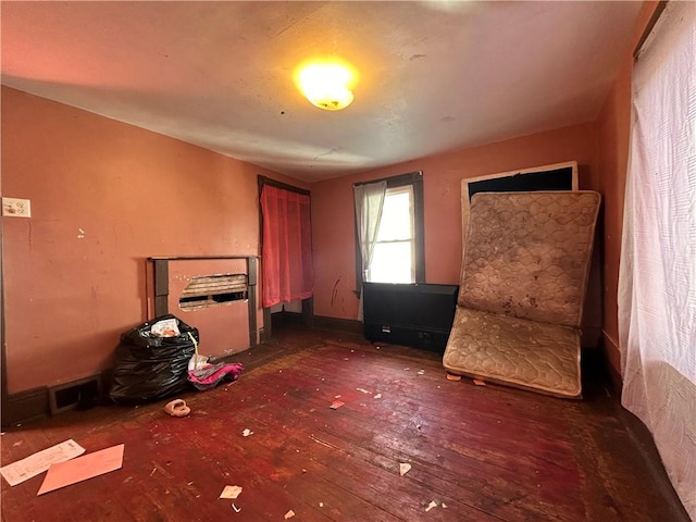 unfurnished room featuring dark hardwood / wood-style flooring