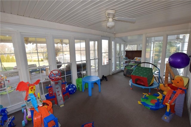 sunroom / solarium with ceiling fan and plenty of natural light