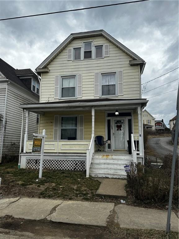 view of front property with covered porch