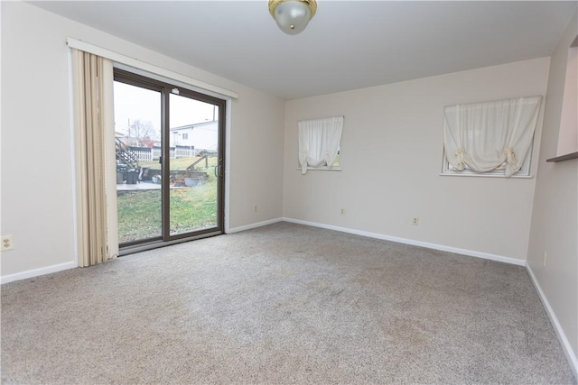 unfurnished room featuring carpet floors