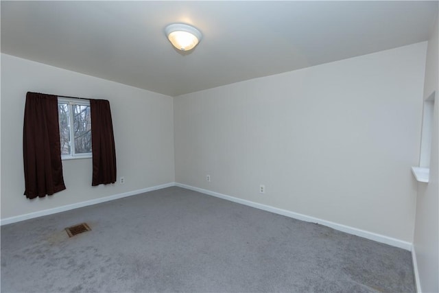 view of carpeted spare room