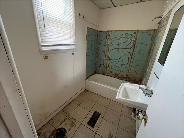 bathroom with tile patterned floors, sink, and tub / shower combination