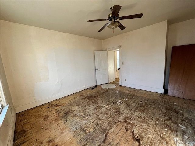 interior space featuring hardwood / wood-style floors and ceiling fan