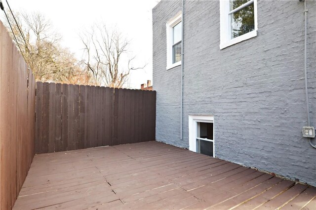 exterior space featuring a wooden deck