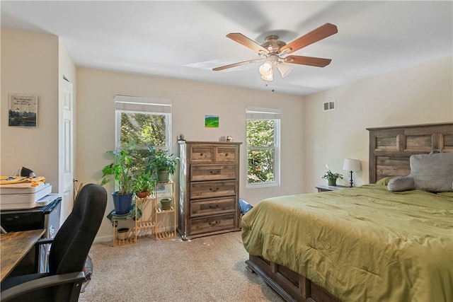 bedroom featuring ceiling fan and carpet floors