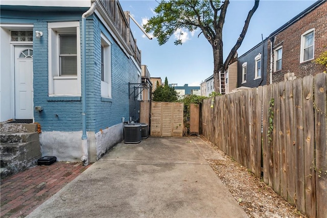 2819 Jane St, South Side, PA 15203 - view of side of property featuring brick siding and a patio