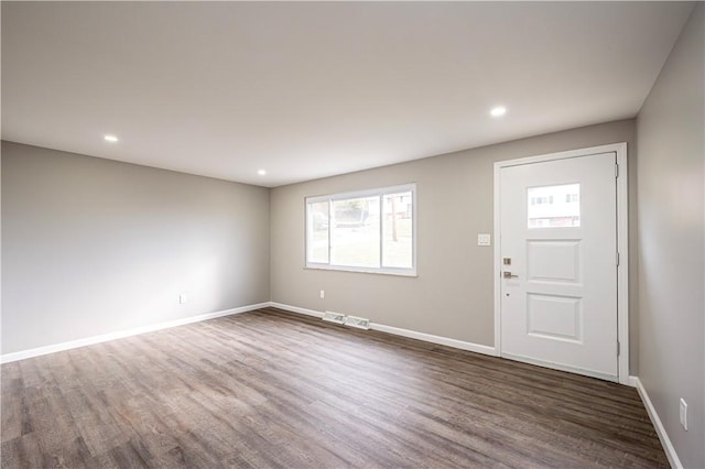 foyer featuring dark hardwood / wood-style floors