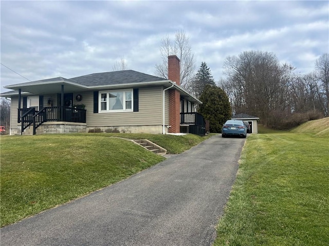 view of property exterior featuring a yard and a porch