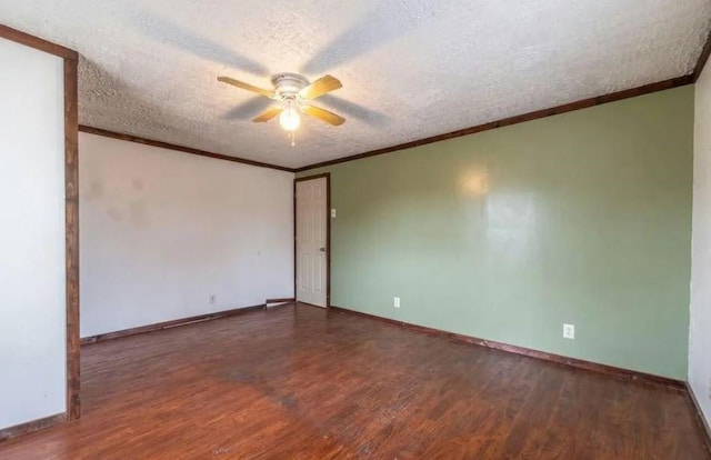 spare room featuring wood-type flooring, a textured ceiling, ceiling fan, and crown molding