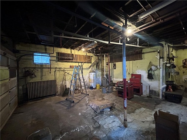 basement featuring water heater