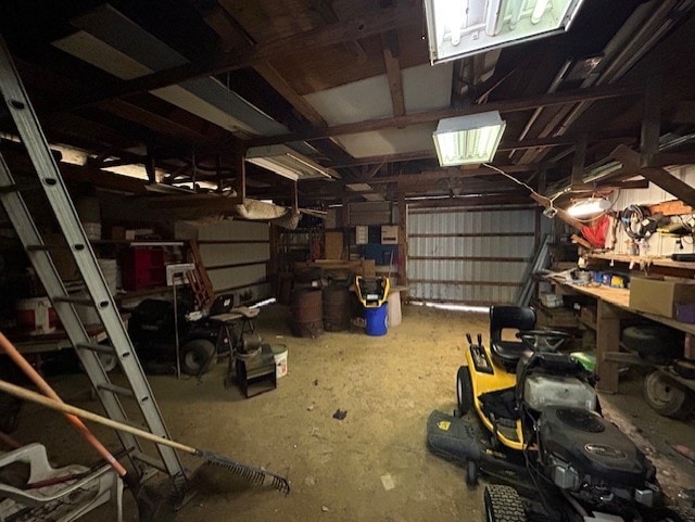 garage with a workshop area