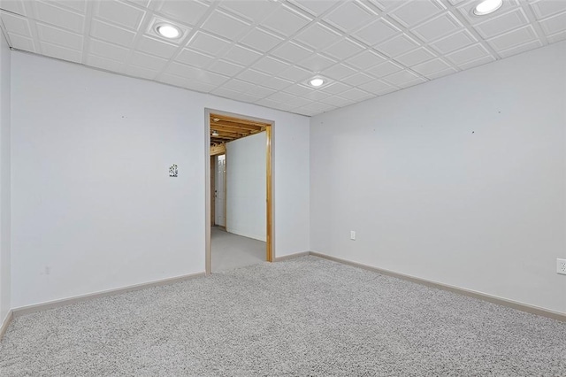 empty room featuring light carpet