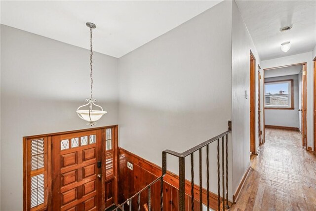 foyer entrance featuring wood-type flooring