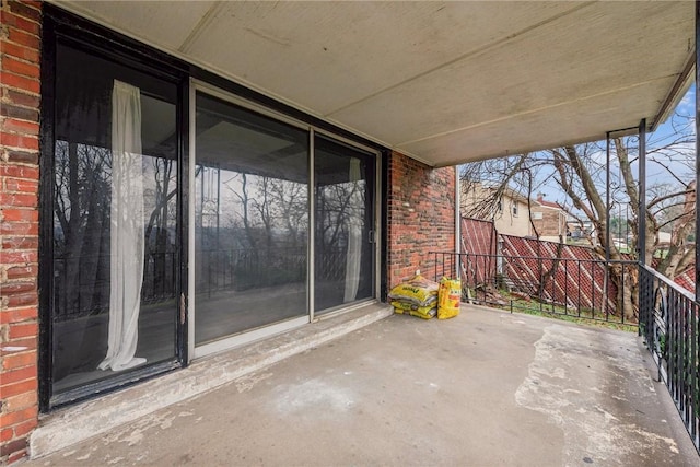 view of patio with a balcony