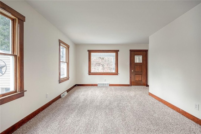 view of carpeted spare room