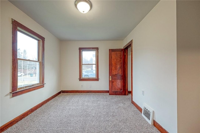 view of carpeted spare room