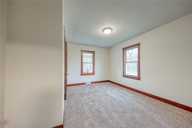 view of carpeted spare room