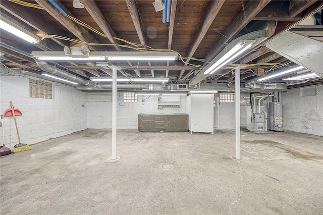 basement with heating unit and water heater