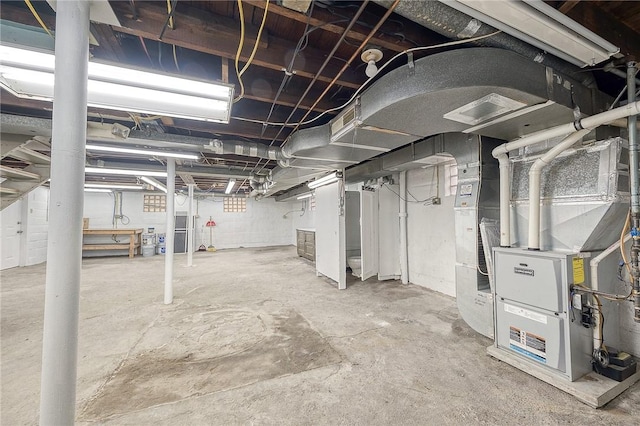 basement featuring heating unit