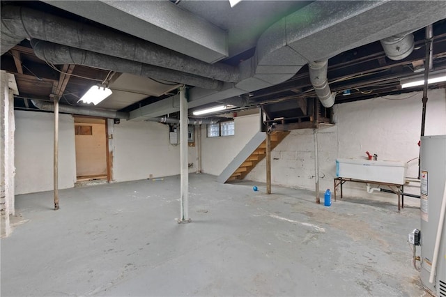 basement with sink and water heater