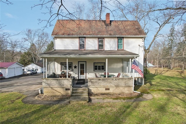 view of front facade featuring a porch and a front yard