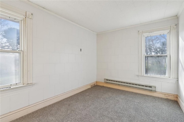 carpeted empty room with crown molding and a baseboard radiator