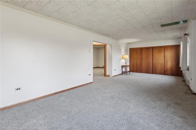 empty room with light colored carpet