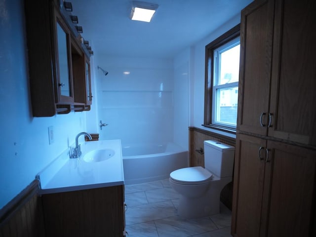 full bathroom with vanity, bathtub / shower combination, and toilet