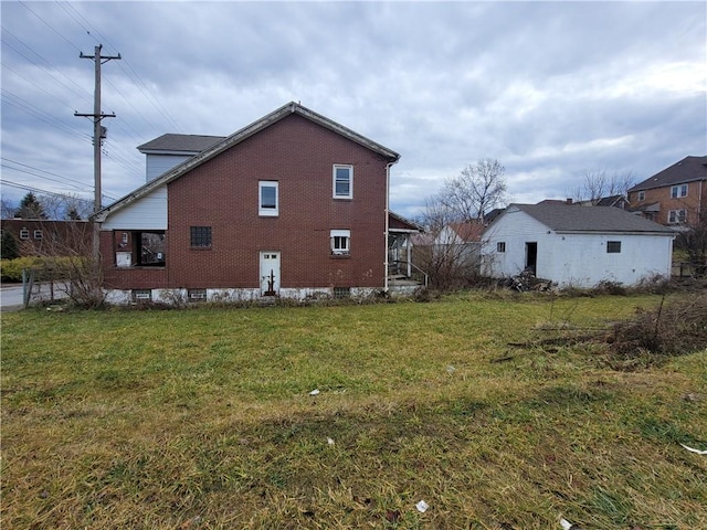 view of property exterior with a lawn