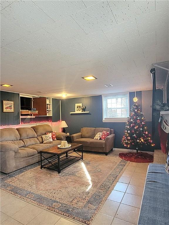 living room featuring tile patterned floors