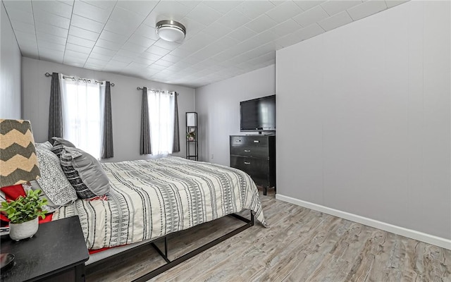 bedroom featuring hardwood / wood-style floors