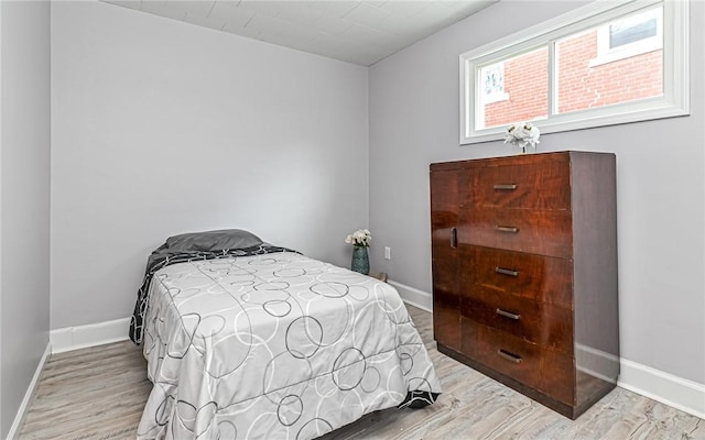 bedroom featuring light hardwood / wood-style flooring