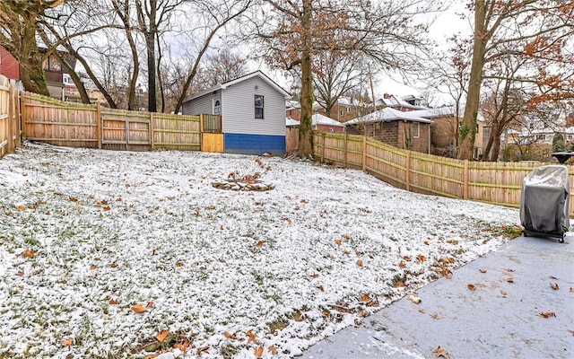 view of yard covered in snow