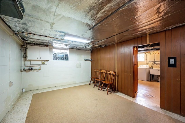 basement with sink and washer / clothes dryer