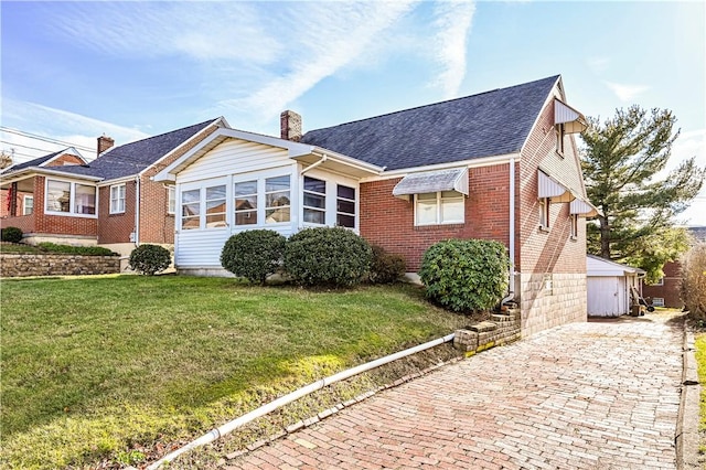 view of front of home with a front yard