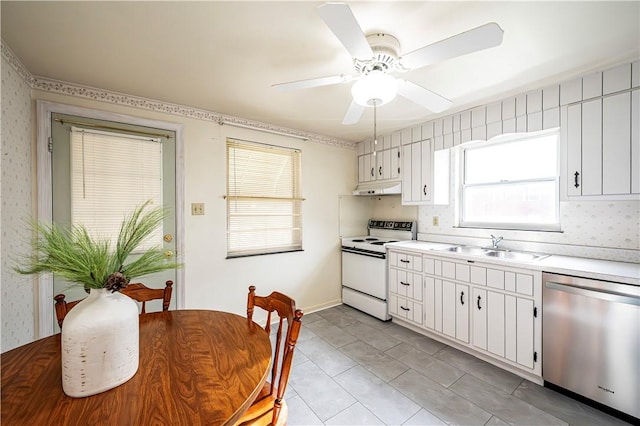 kitchen with dishwasher, sink, ceiling fan, white range with electric stovetop, and white cabinetry