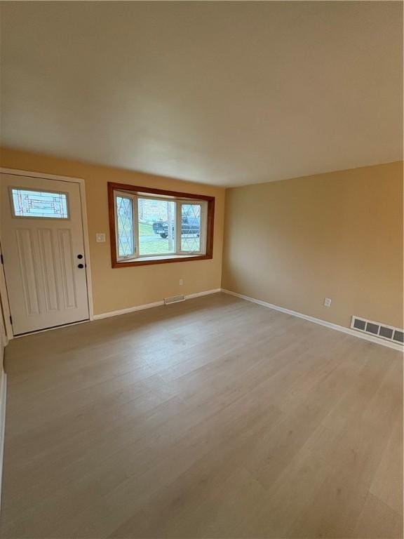 interior space with light hardwood / wood-style floors