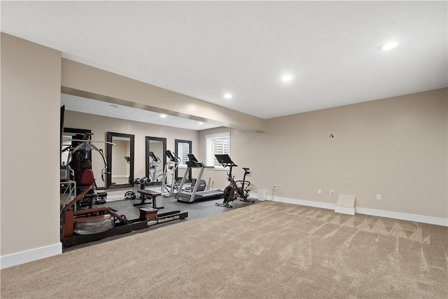 workout room featuring carpet flooring